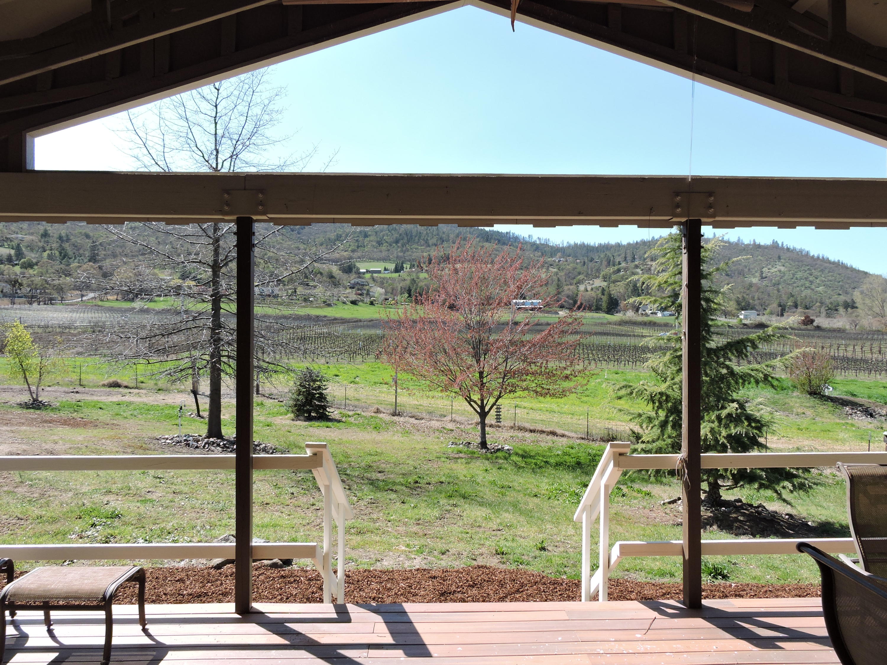 1381 Foss Road Talent, OR 97540 - Photo 24 of 41 Inviting covered back deck with expansive mountain views