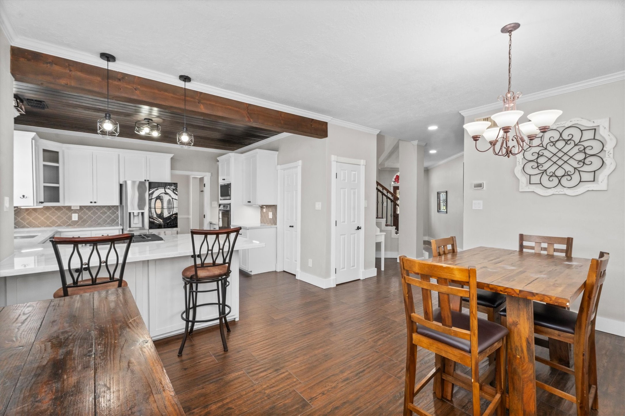 10402 Hondo Hill Road Houston, TX 77064 - Photo 14 of 40 a view of a dining room with furniture and wooden floor