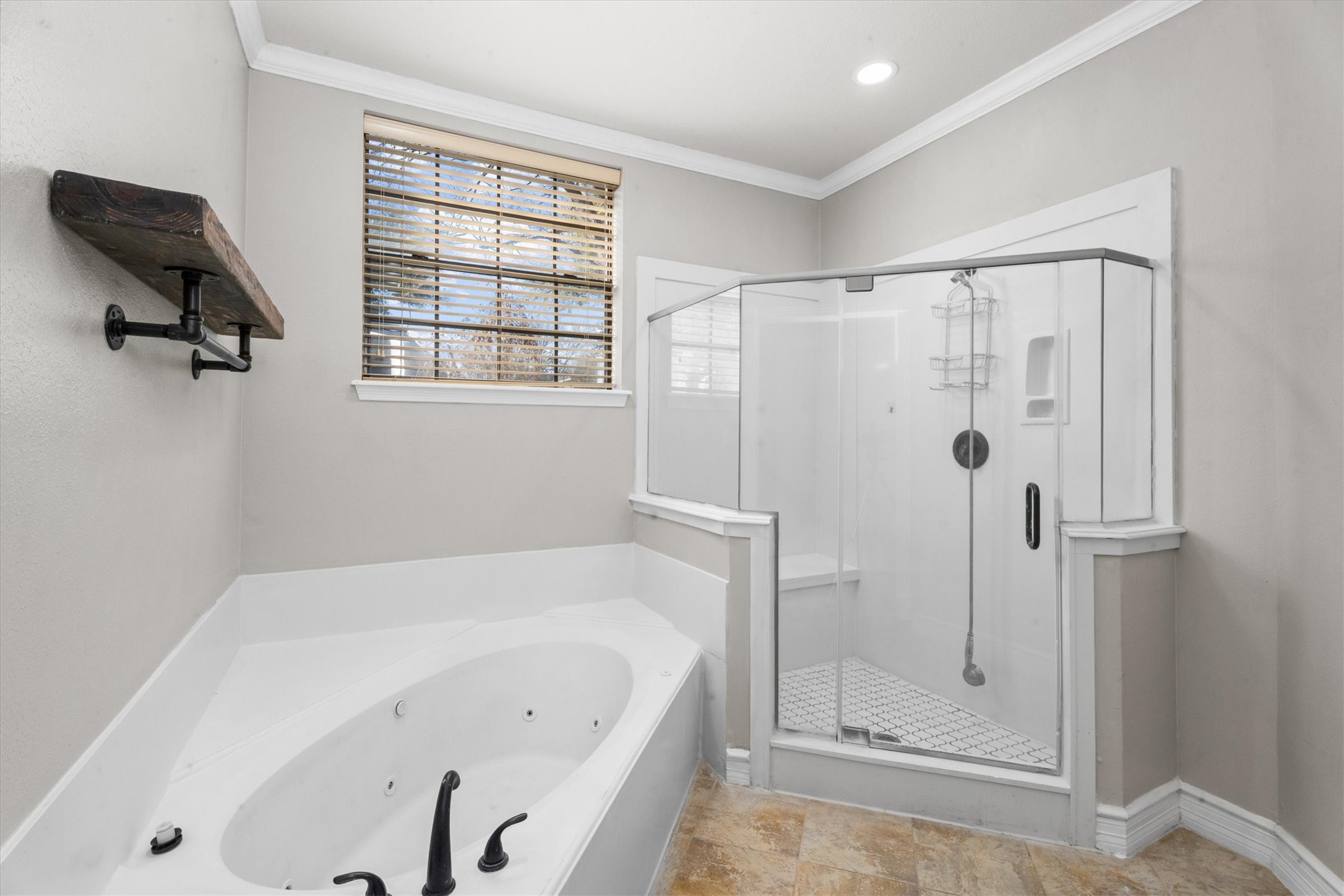 10402 Hondo Hill Road Houston, TX 77064 - Photo 25 of 40 a bathroom with a bathtub and a shower