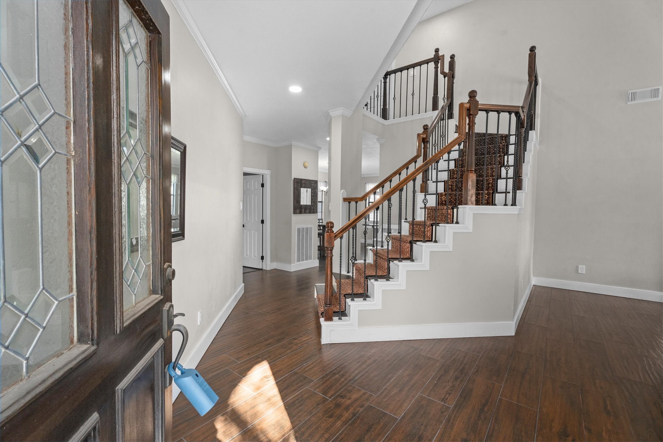 10402 Hondo Hill Road Houston, TX 77064 - Photo 26 of 40 a view of entryway and hall with wooden floor