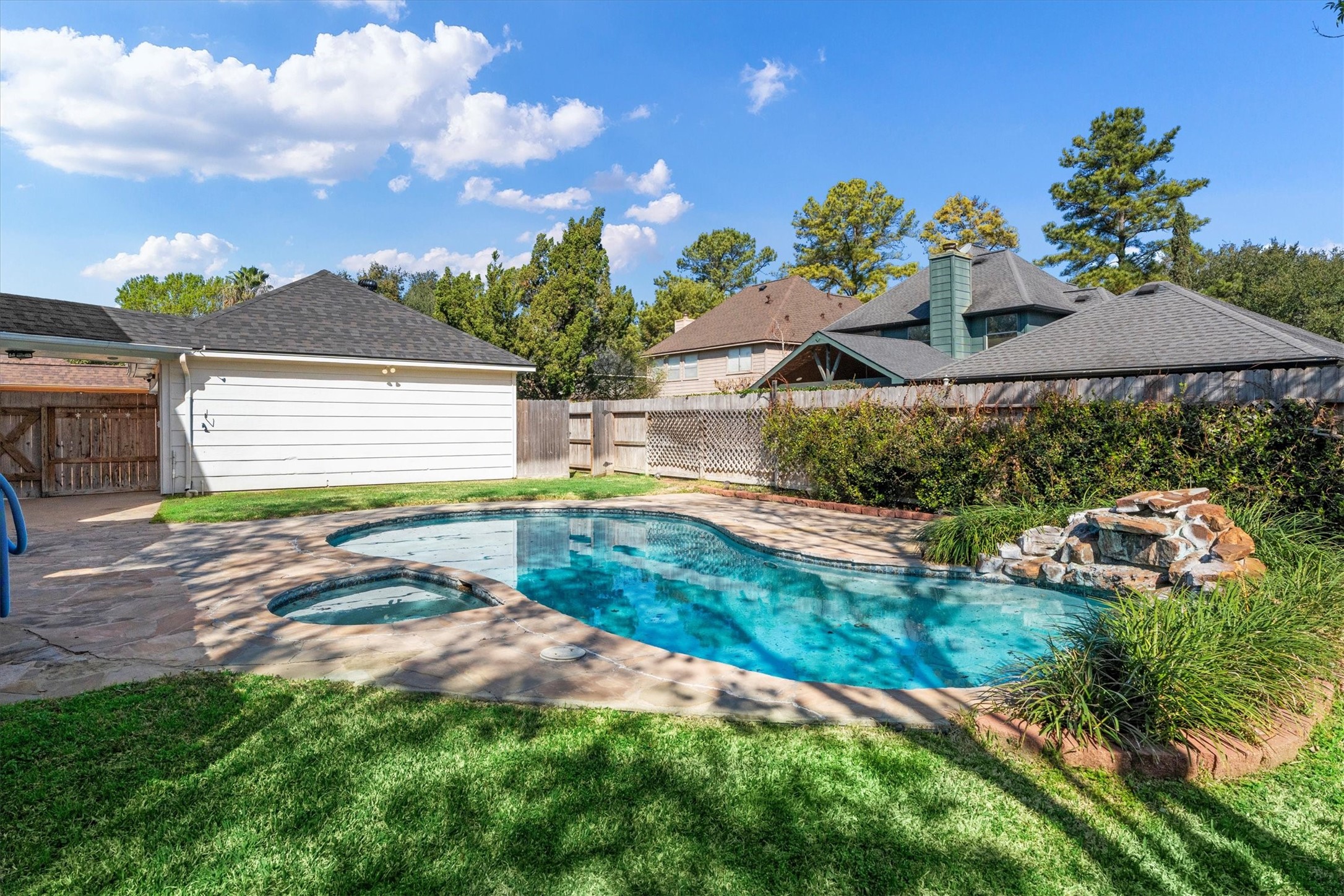 10402 Hondo Hill Road Houston, TX 77064 - Photo 37 of 40 a front view of a house with a yard