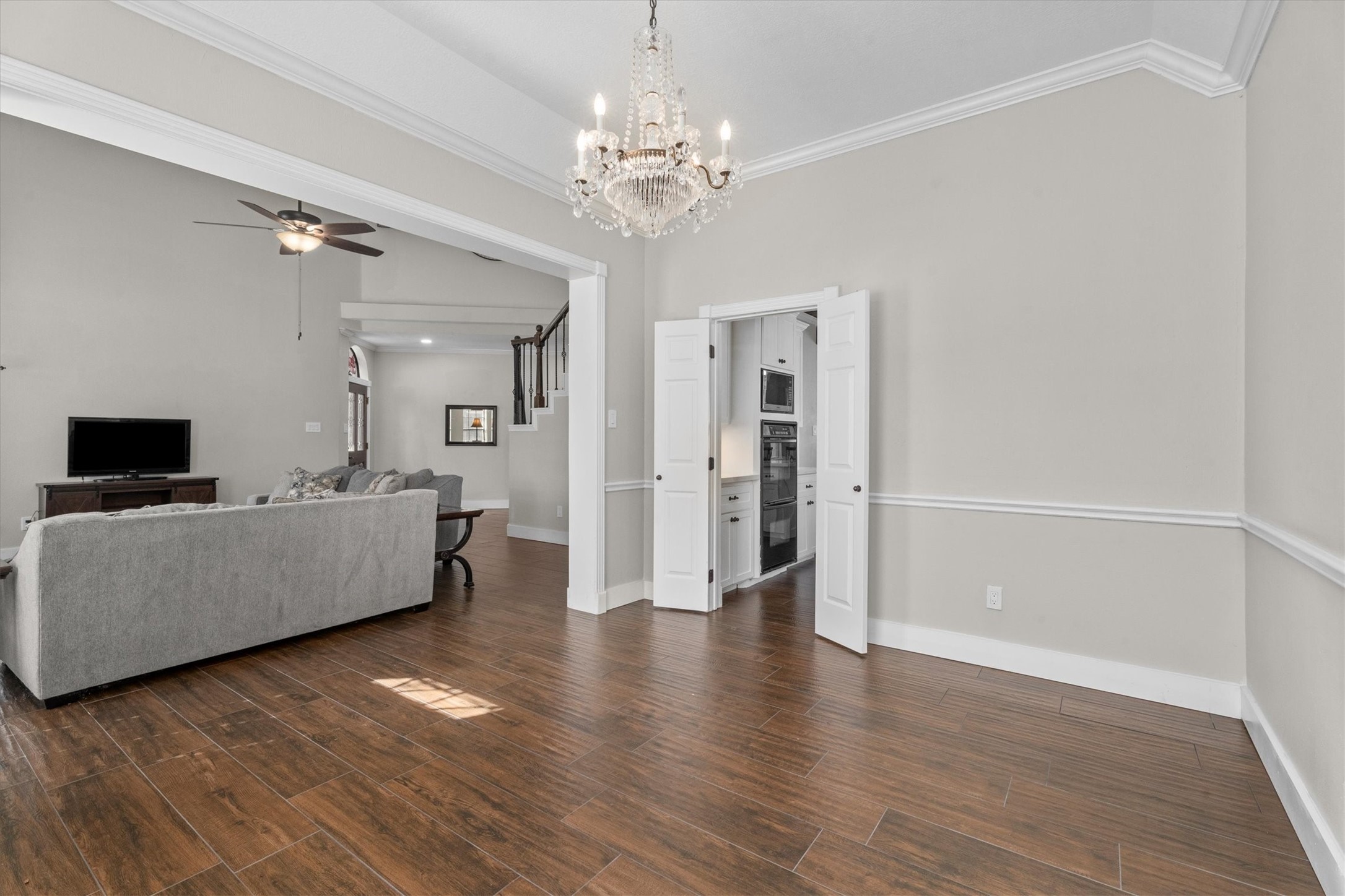 10402 Hondo Hill Road Houston, TX 77064 - Photo 10 of 40 a living room with furniture and a wooden floor