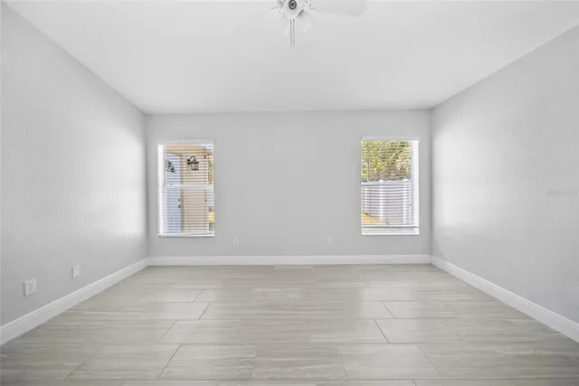 an empty room with windows