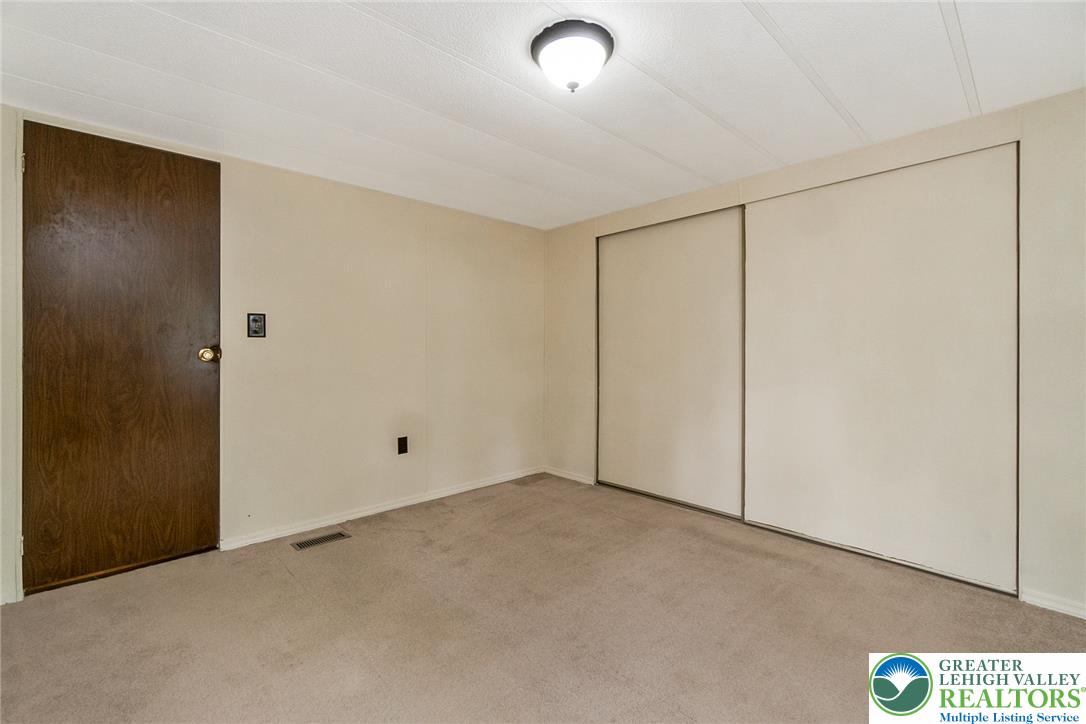 8721 Turkey Ridge Road Breinigsville, PA 18031 - Photo 25 of 30 Carpeted flooring and generous built-in closet storage define this functional space.