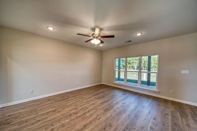 an empty room with windows