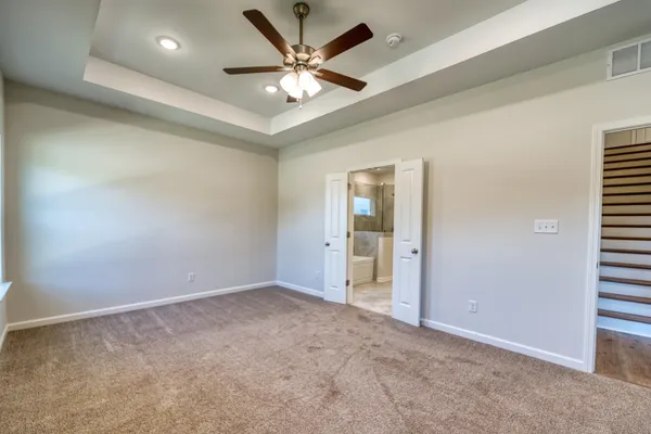 a kitchen with granite countertop a sink stainless steel appliances and cabinets