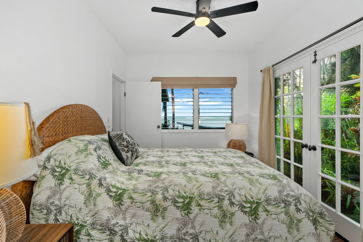 4271 Anini Road Princeville, HI 96722 - Photo 15 of 24 a bedroom with a bed and a window