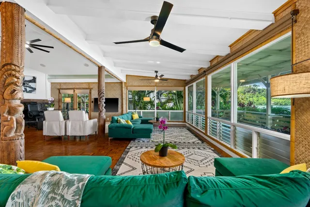 a outdoor space with patio the couches and a dining table with garden view