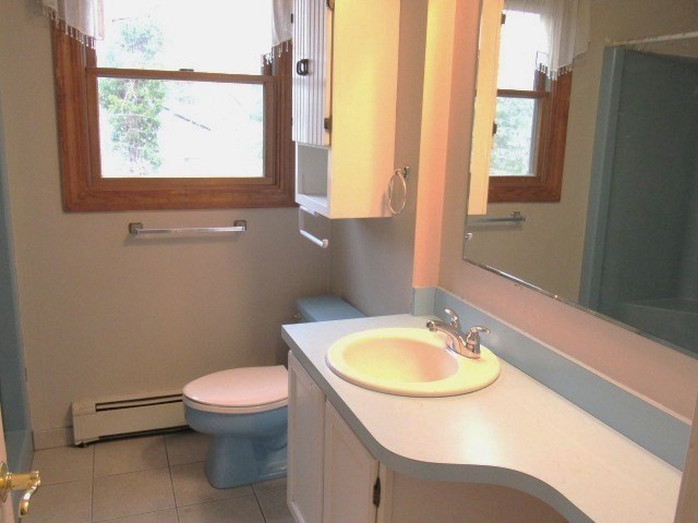 83 Chippy Lane Methuen, MA 01844 - Photo 6 of 19 a bathroom with a sink and a toilet