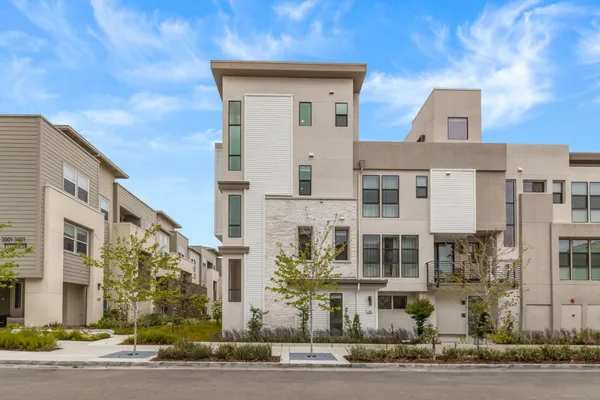 a front view of a multi story residential apartment building