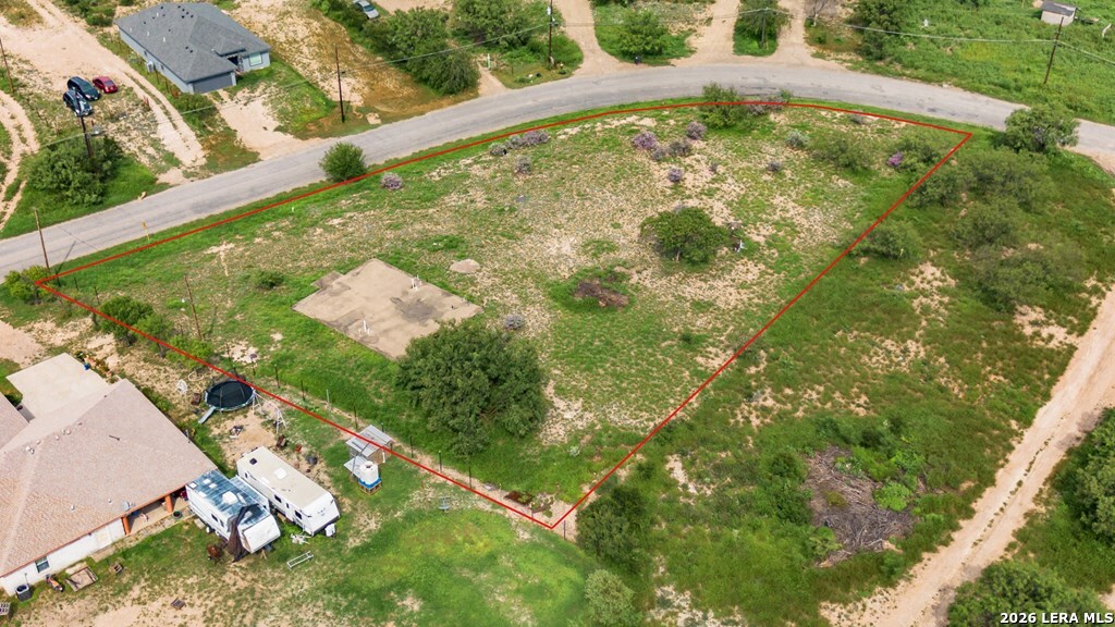 1326 Wagon Wheel Road Eagle Pass, TX 78852 - Photo 11 of 17 a view of a yard with potted plants