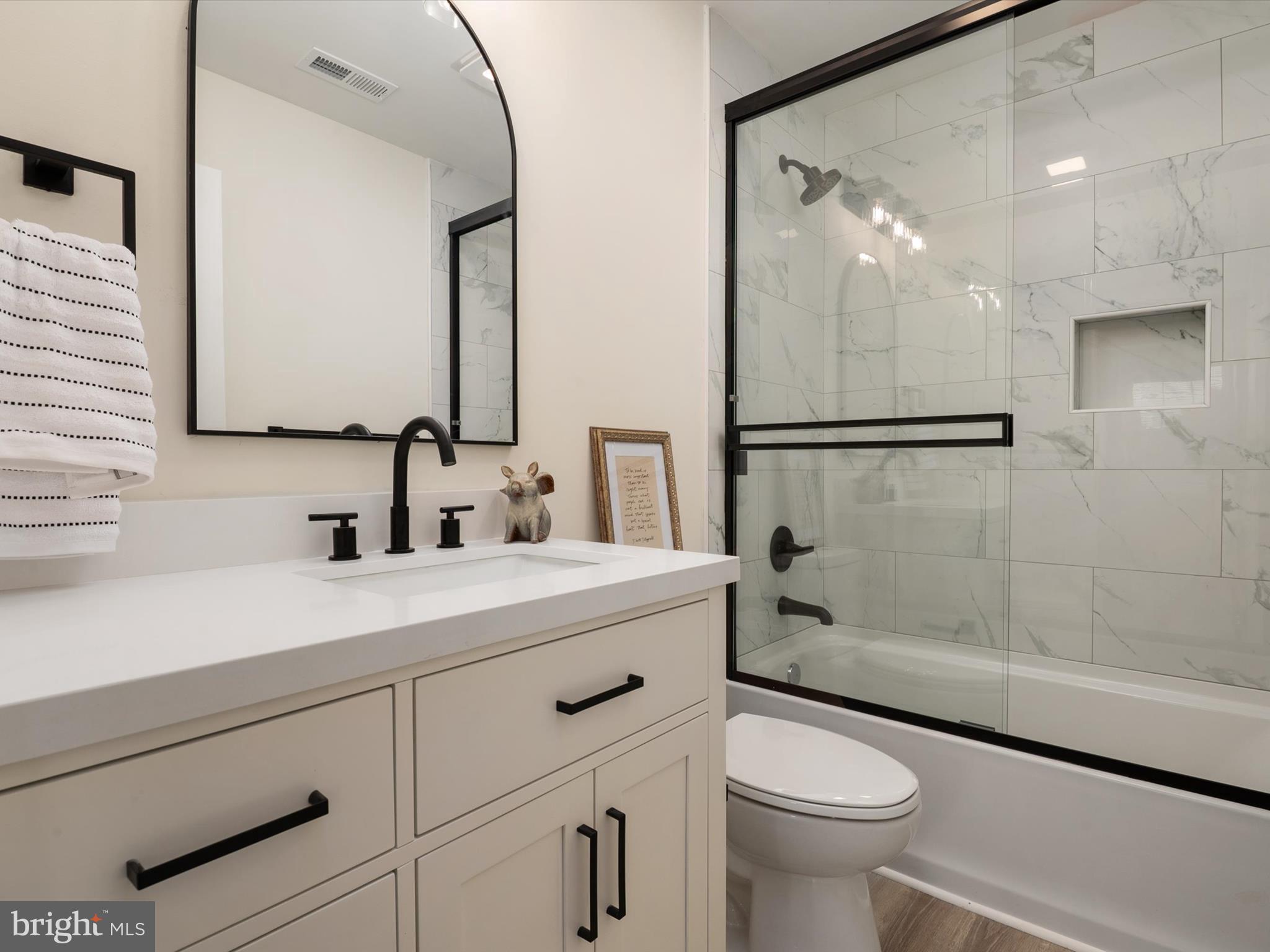 1 Sunrise Avenue Ridgely, MD 21660 - Photo 26 of 28 a bathroom with a sink a toilet and shower