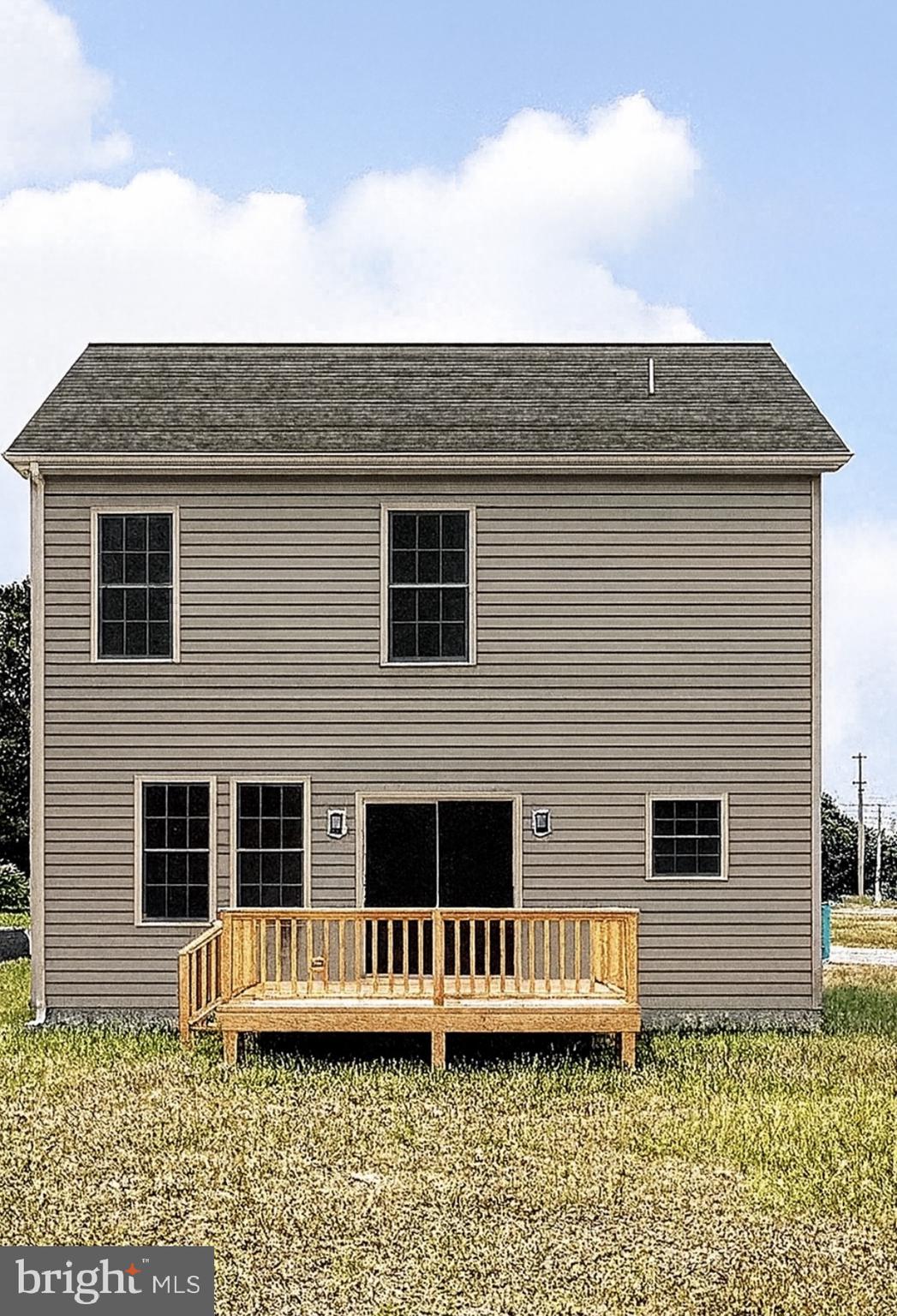 1 Sunrise Avenue Ridgely, MD 21660 - Photo 3 of 28 a front view of a house with windows