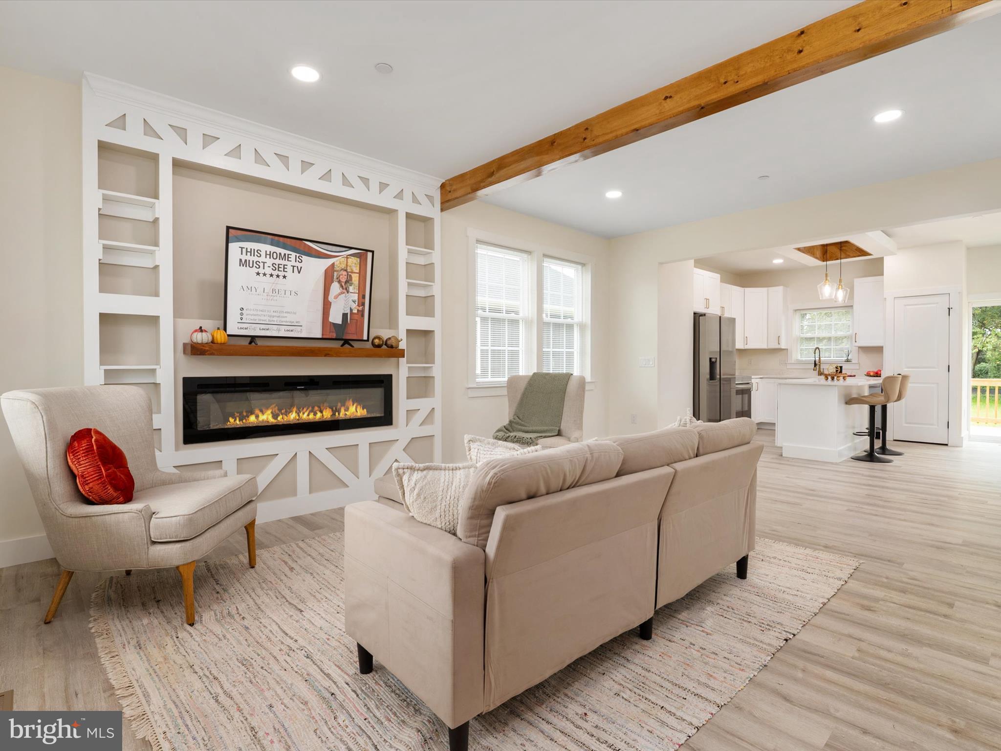 1 Sunrise Avenue Ridgely, MD 21660 - Photo 5 of 28 a living room with furniture and a flat screen tv