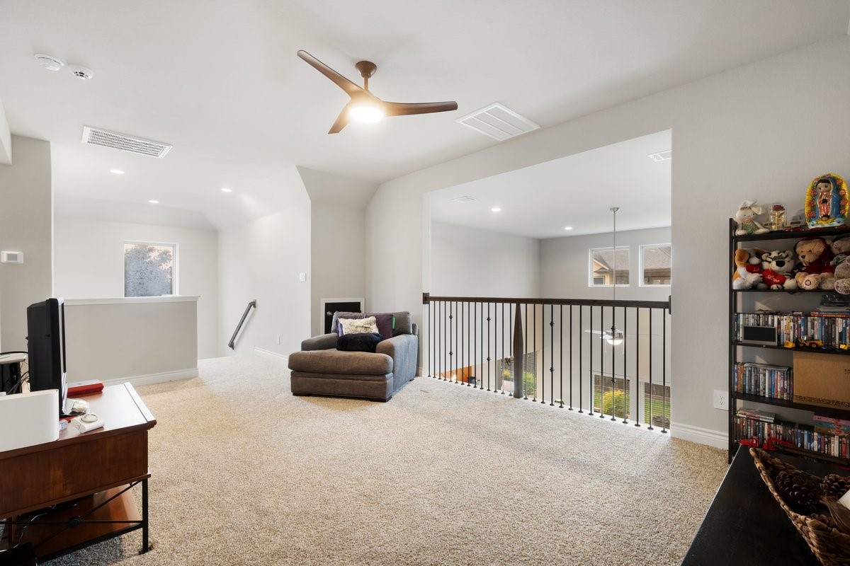 15815 Gibson Grass Court Spring, TX 77379 - Photo 17 of 25 a hallway with furniture