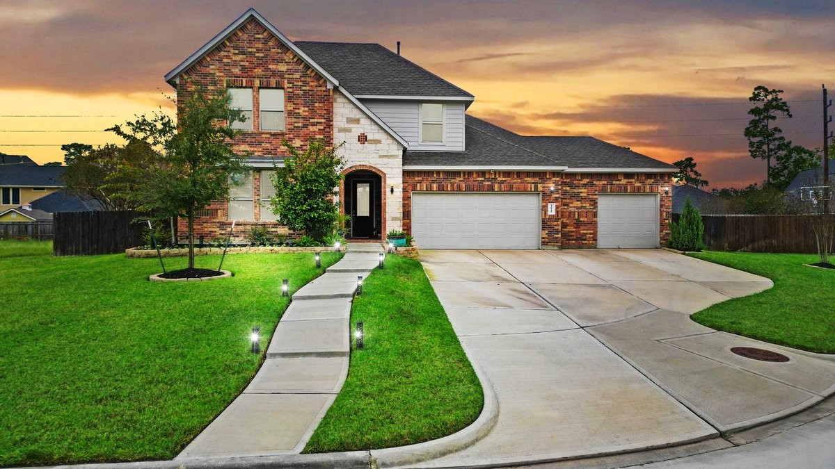 15815 Gibson Grass Court Spring, TX 77379 - Photo 2 of 25 front view of a house with a yard