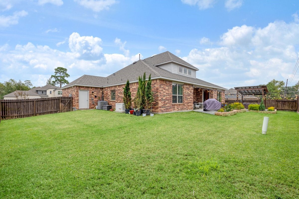 15815 Gibson Grass Court Spring, TX 77379 - Photo 21 of 25 front view of a house with a yard