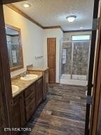 211 North Springview Road Maryville, TN 37801 - Photo 19 of 27 a bathroom with sink shower and a mirror