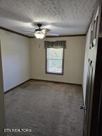 211 North Springview Road Maryville, TN 37801 - Photo 23 of 27 an empty room with a empty space and windows