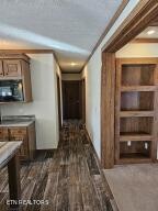 211 North Springview Road Maryville, TN 37801 - Photo 27 of 27 a view of a hallway with closet and a fireplace