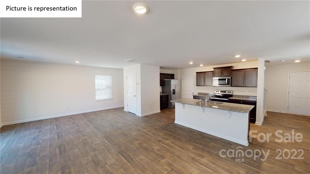 5038 Fandango Road York, SC 29745 - Photo 8 of 26 a view of kitchen with wooden floor