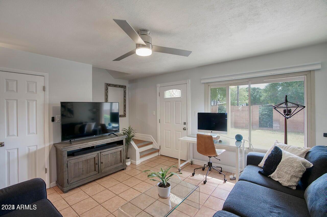 6155 North Granite Reef Road Scottsdale, AZ 85250 - Photo 2 of 18 Light and open Family room.