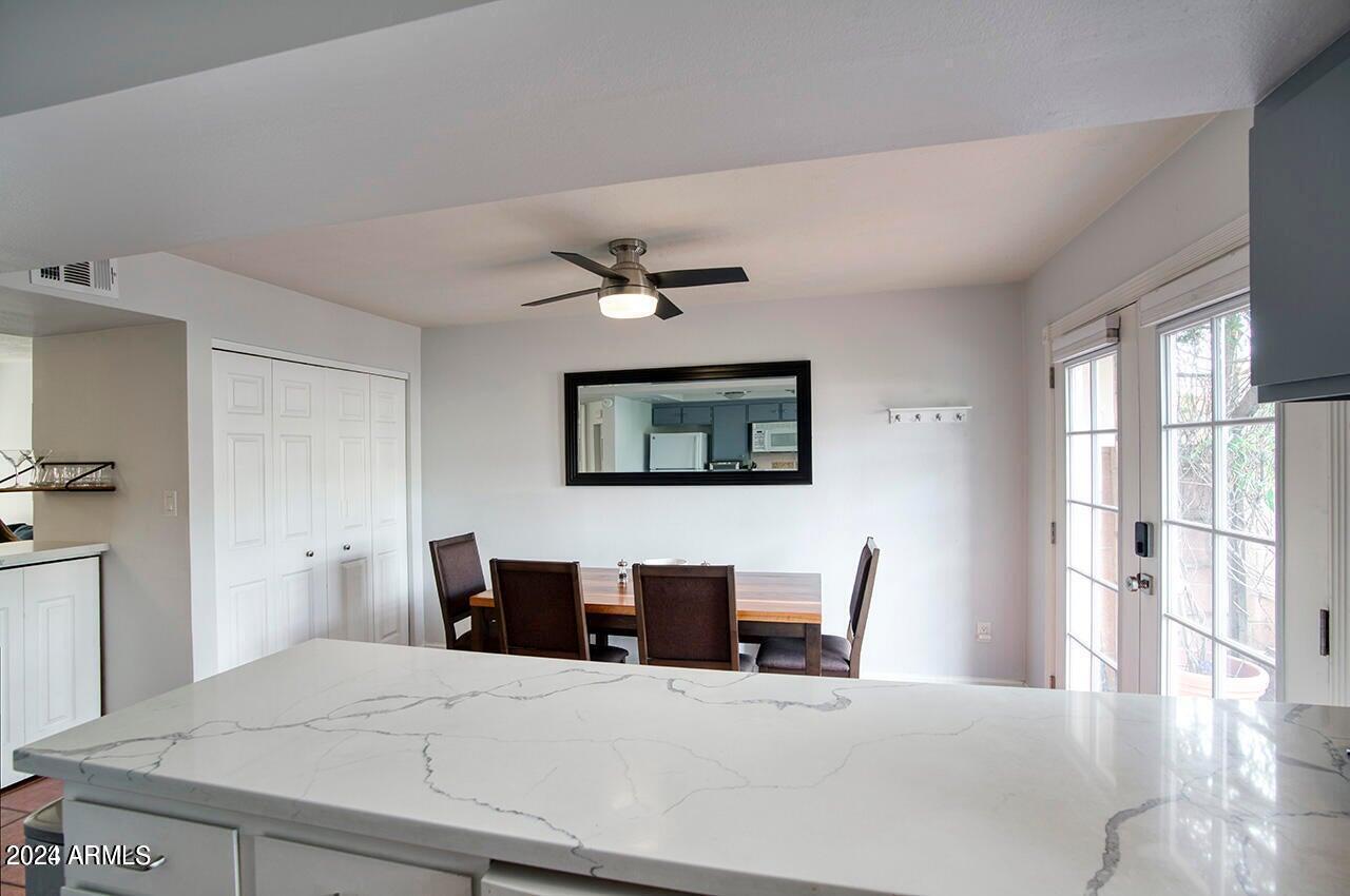 6155 North Granite Reef Road Scottsdale, AZ 85250 - Photo 8 of 18 Kitchen open to DIning room