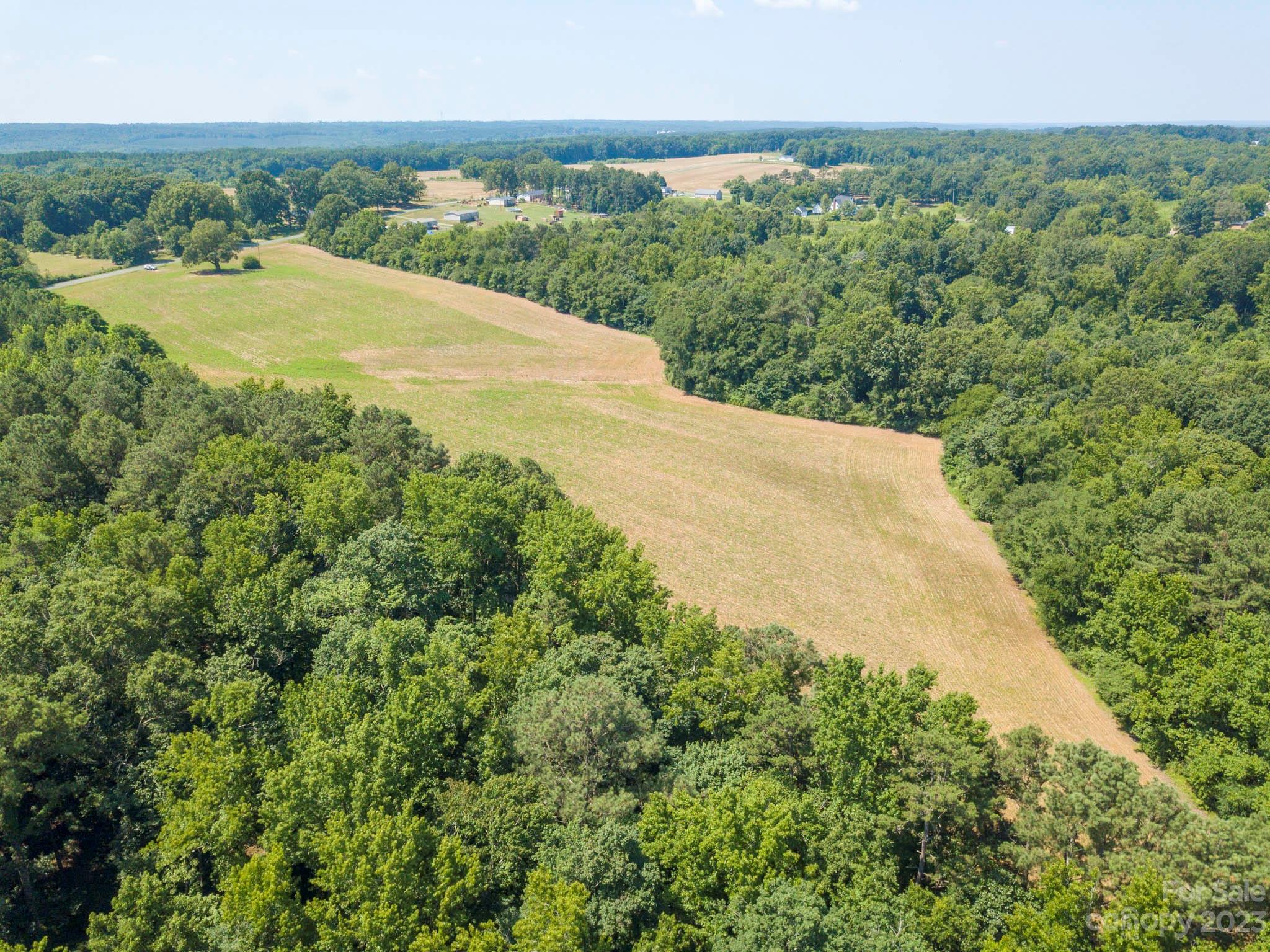 1 State Line Road, Unit 1 Marshville, NC 28103 - Photo 14 of 19 a view of a yard with a garden