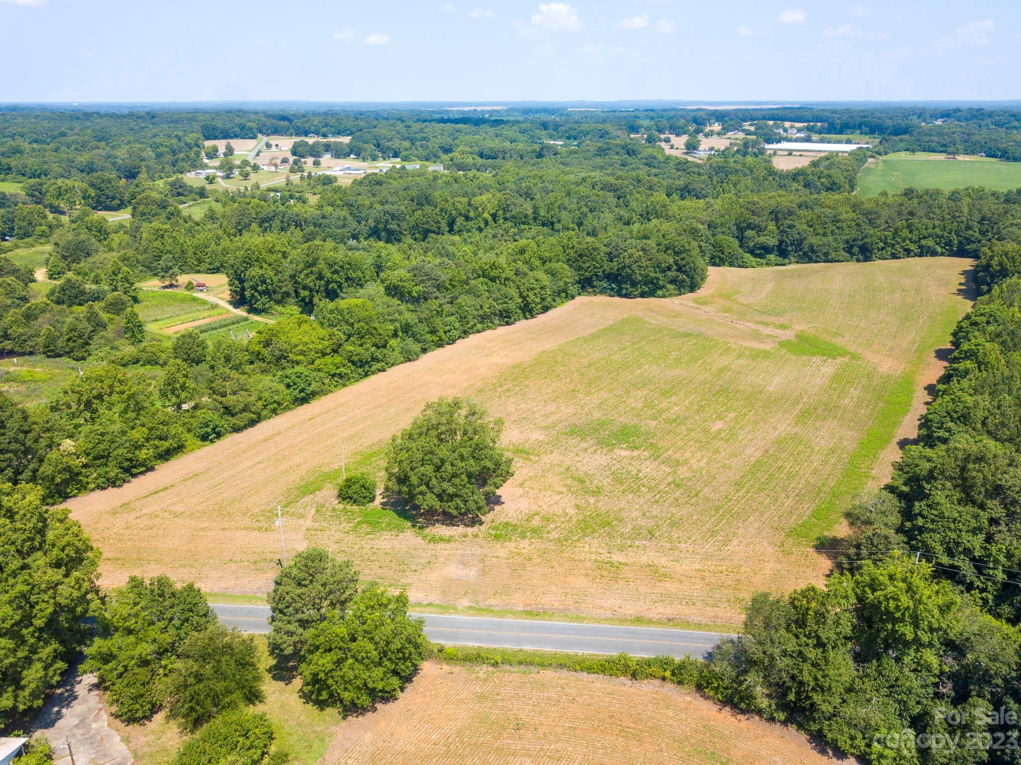 1 State Line Road, Unit 1 Marshville, NC 28103 - Photo 17 of 19 a view of a big yard with large trees
