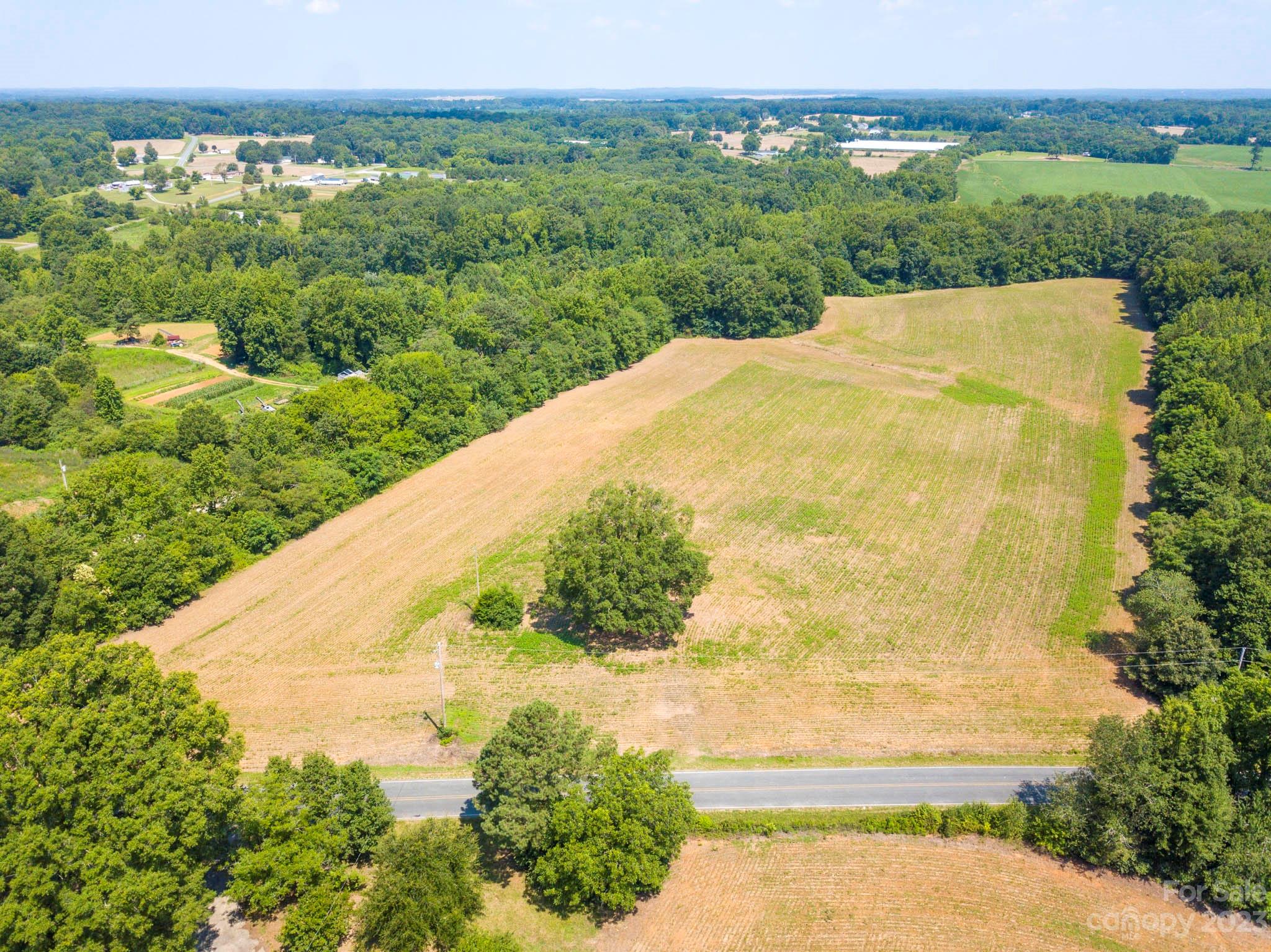 1 State Line Road, Unit 1 Marshville, NC 28103 - Photo 18 of 19 a view of a large yard with lots of green space