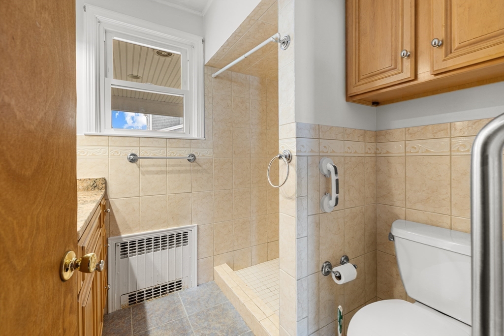 16 Reservation Road Fairhaven, MA 02719 - Photo 17 of 38 a bathroom with a toilet and a shower