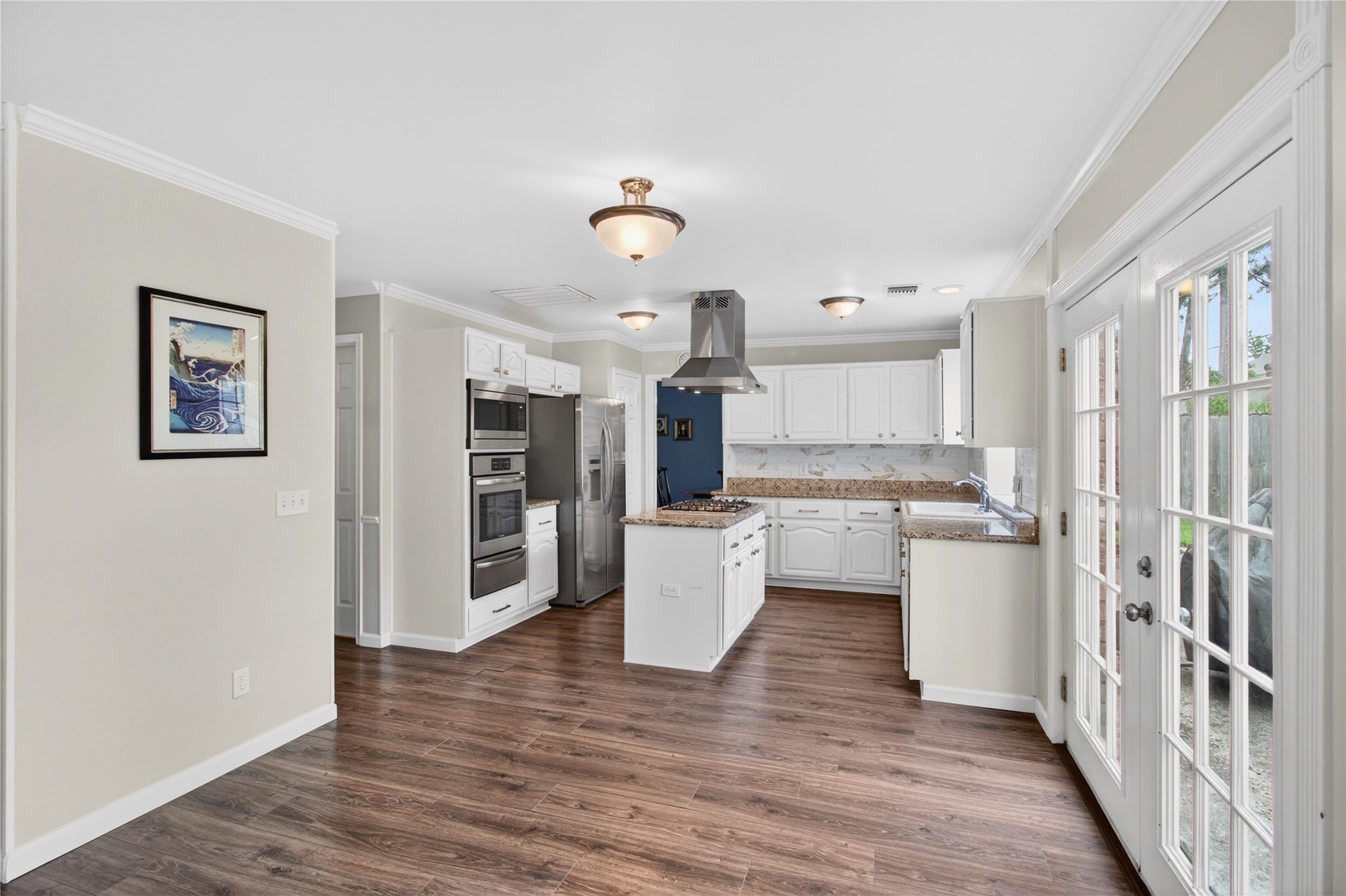 20214 Woodsboro Court Spring, TX 77388 - Photo 14 of 50 Breakfast Area! Recently Updated Kitchen! Painted cabinets, Stainless Appliances & Vent Hood, Tile Backsplash! Recently Painted Interior! Luxury Vinyl Plank throughout 1st Floor!
