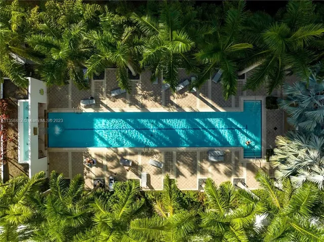 a wooden fence with some plants