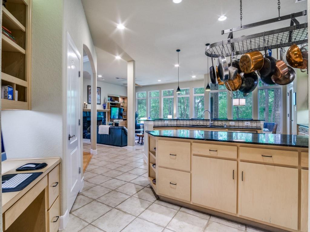 1014 Amanda Drive Mansfield, TX 76063 - Photo 16 of 40 a kitchen with lots of counter space and stainless steel appliances