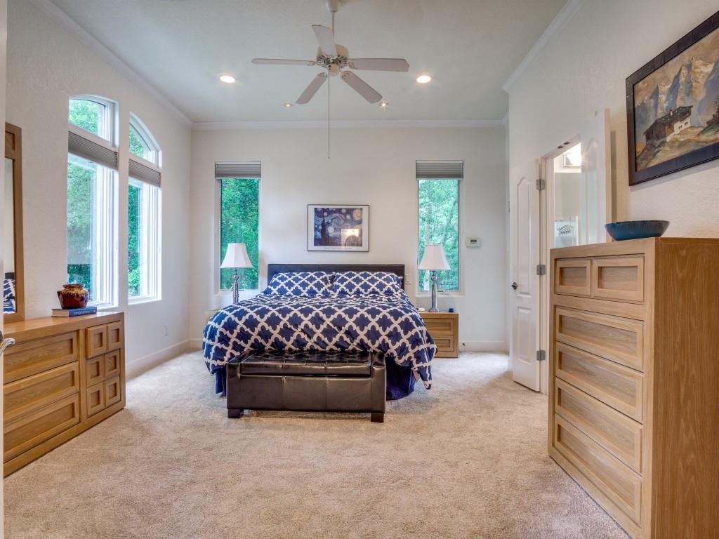 1014 Amanda Drive Mansfield, TX 76063 - Photo 17 of 40 a bed room with a bed window and a dresser