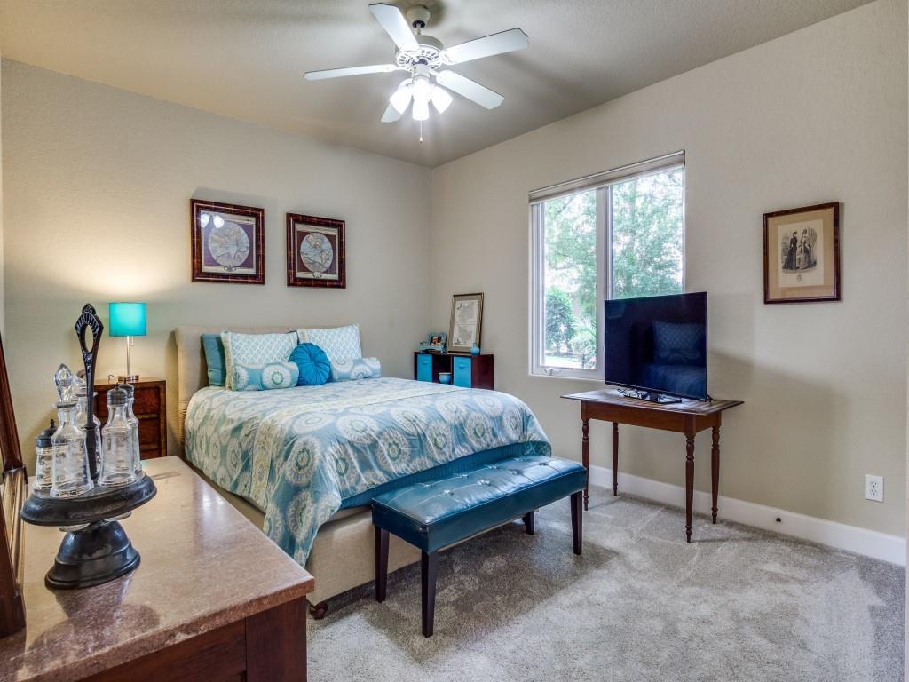 1014 Amanda Drive Mansfield, TX 76063 - Photo 20 of 40 a living room with furniture and a flat screen tv