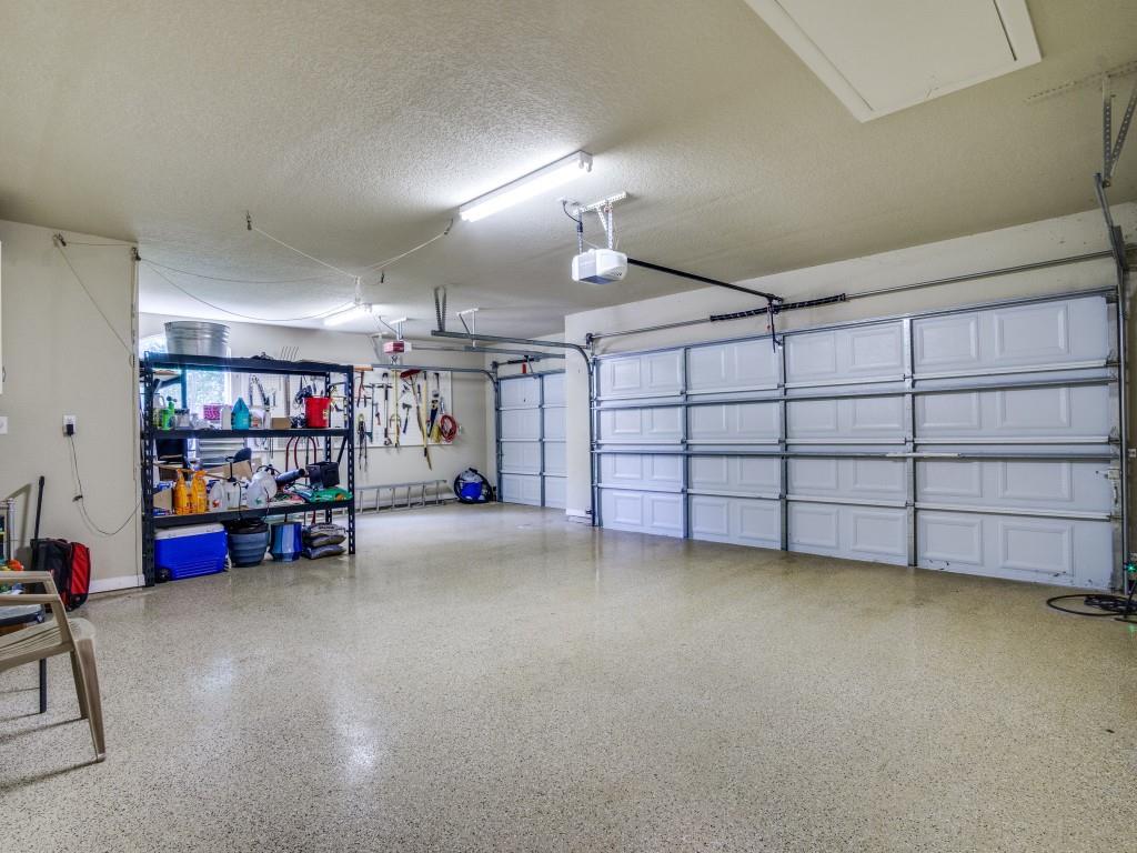 1014 Amanda Drive Mansfield, TX 76063 - Photo 24 of 40 a view of a garage with storage