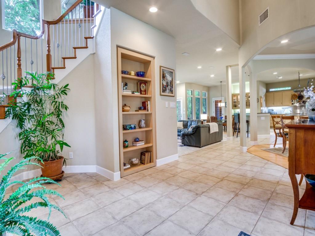 1014 Amanda Drive Mansfield, TX 76063 - Photo 26 of 40 a living room with furniture potted plant and a table