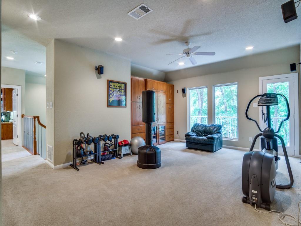 1014 Amanda Drive Mansfield, TX 76063 - Photo 28 of 40 a view of a room with gym equipment