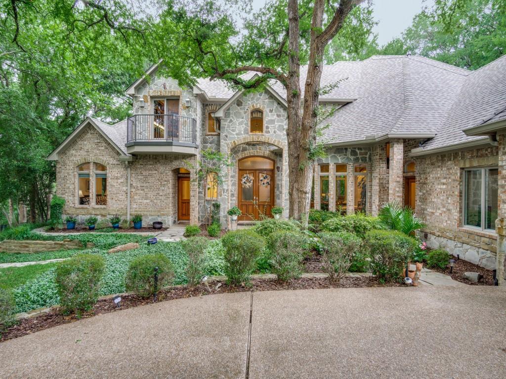 1014 Amanda Drive Mansfield, TX 76063 - Photo 38 of 40 a front view of a house with a garden and plants