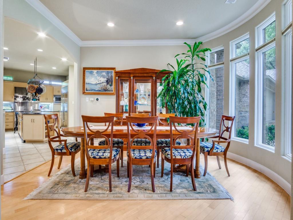 1014 Amanda Drive Mansfield, TX 76063 - Photo 4 of 40 a view of a dining room with furniture window and wooden floor