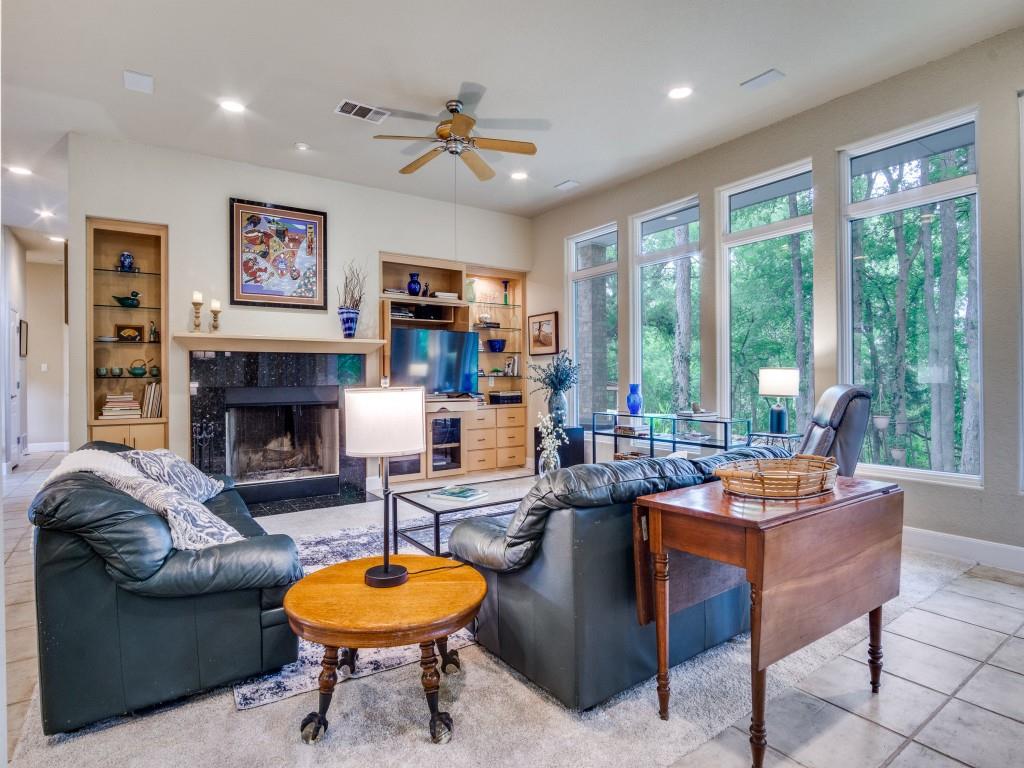 1014 Amanda Drive Mansfield, TX 76063 - Photo 5 of 40 a living room with fireplace furniture and a large window