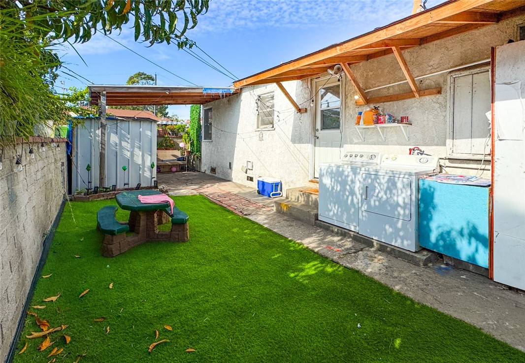 4908 Jillson Street Commerce, CA 90040 - Photo 12 of 17 Laundry Area/Backyard
