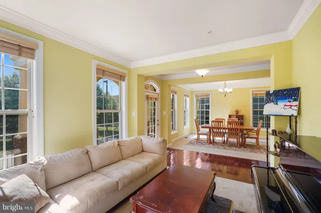 a view of a house with wooden floor and furniture