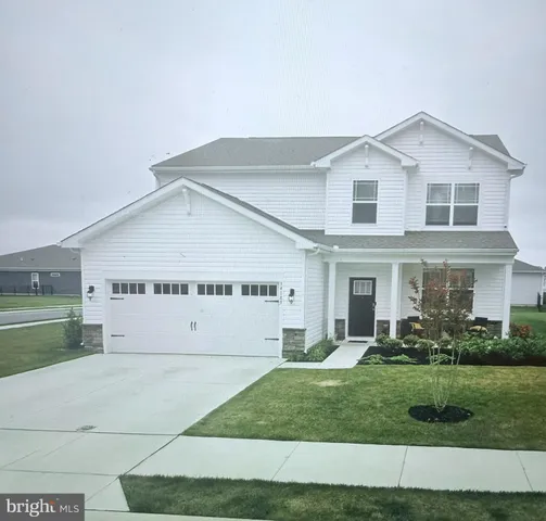 a view of house with garden