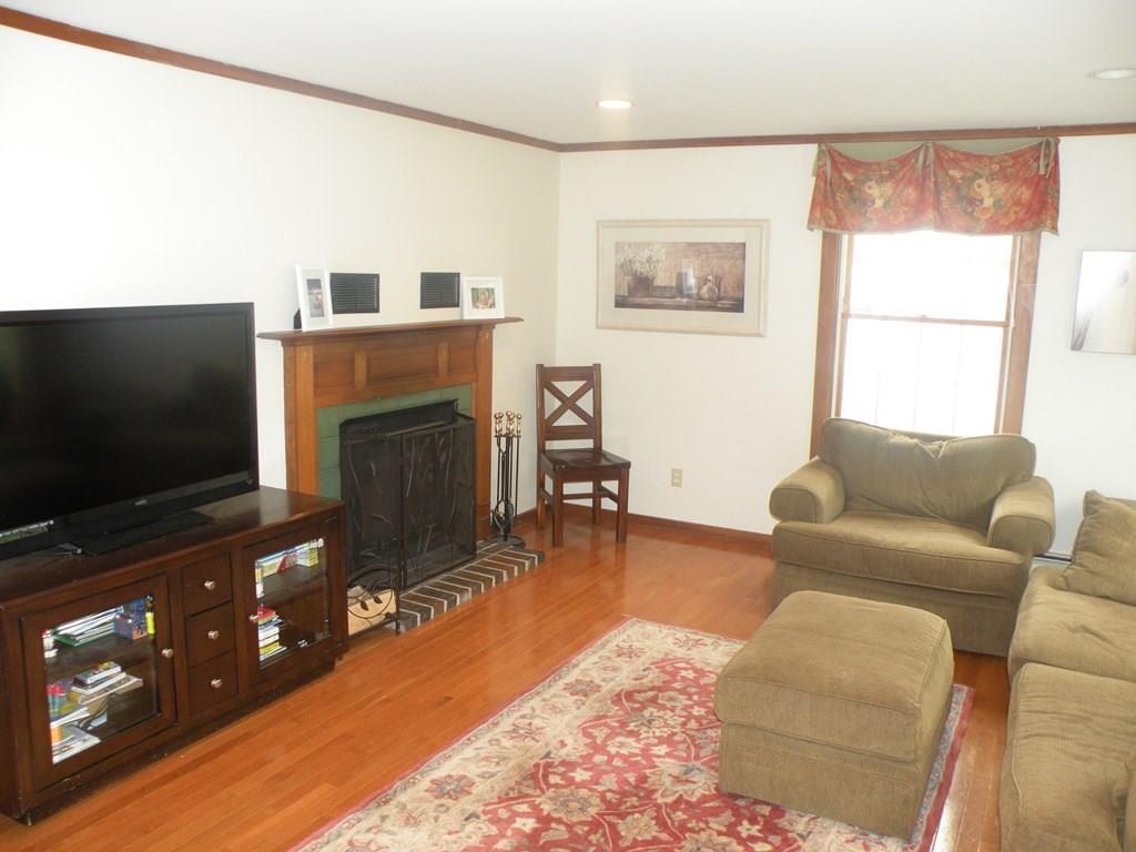 132 Roaring Brook Road Portland, ME 04103 - Photo 8 of 21 Family room with fireplace