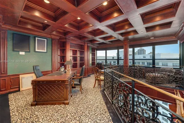 a view of a balcony with couch and wooden floor