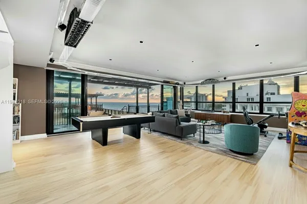 a view of a balcony with chairs