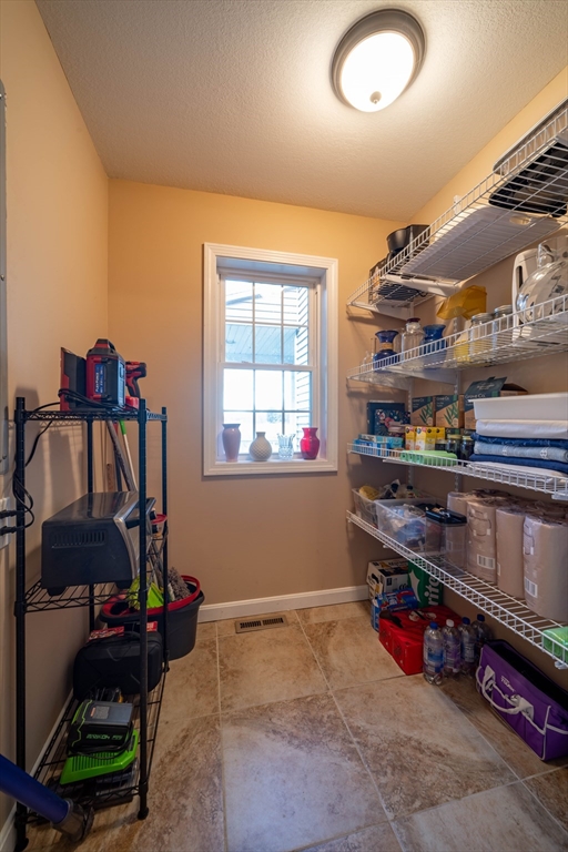 83 Bay Road Hadley, MA 01035 - Photo 13 of 36 a room with lots of storage and utility
