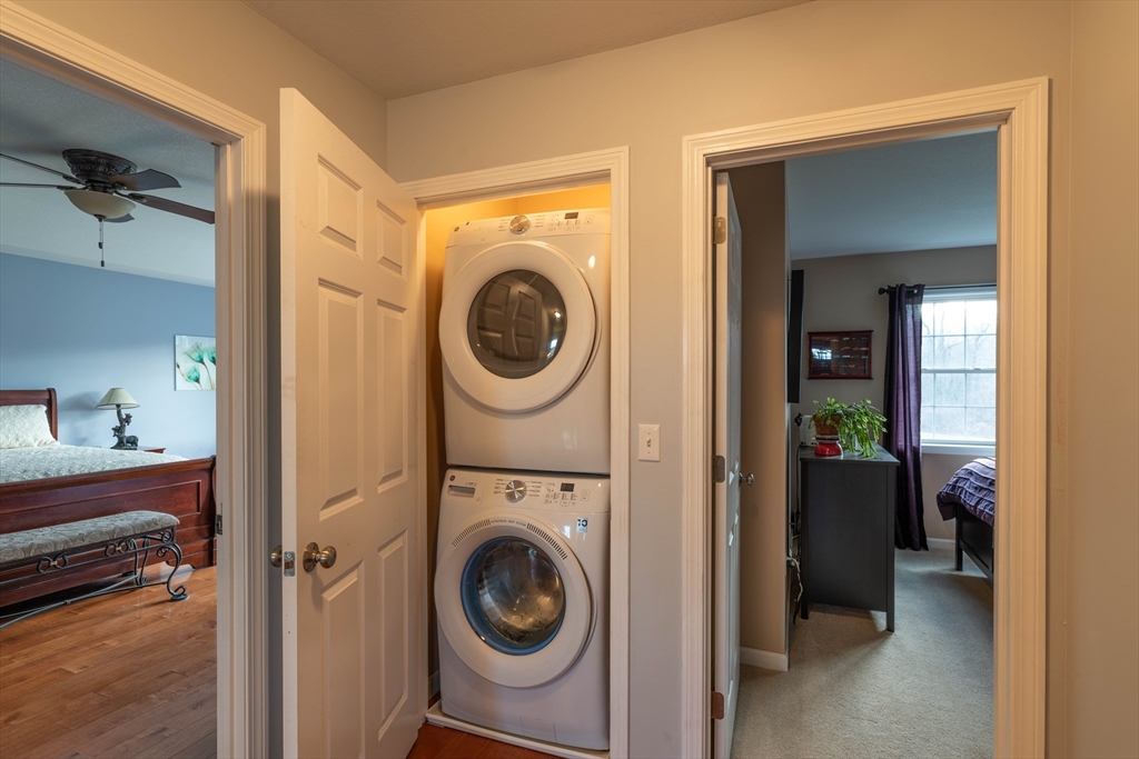 83 Bay Road Hadley, MA 01035 - Photo 20 of 36 a view of a hallway with washer and dryer